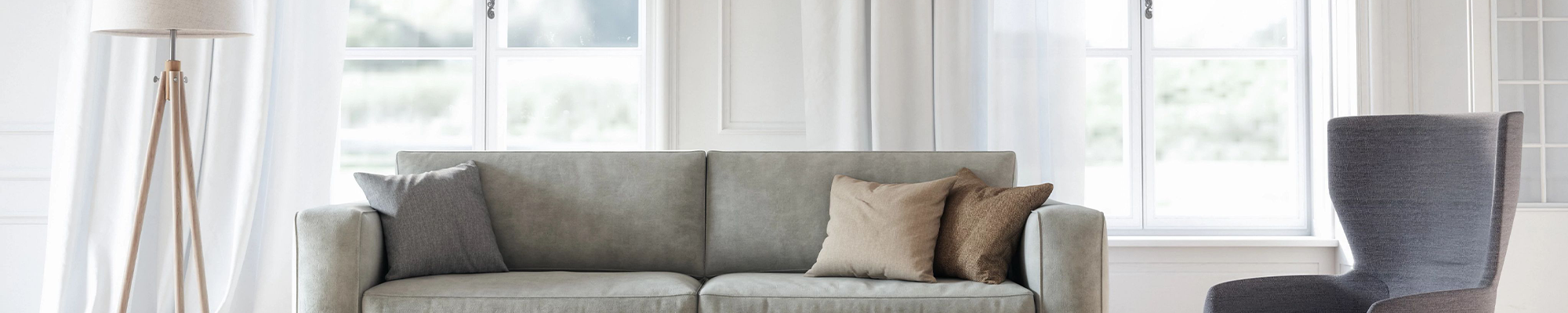 living room with grey furniture in front of large window - Floor Fashions of Virginia in the Charlottesville, VA area