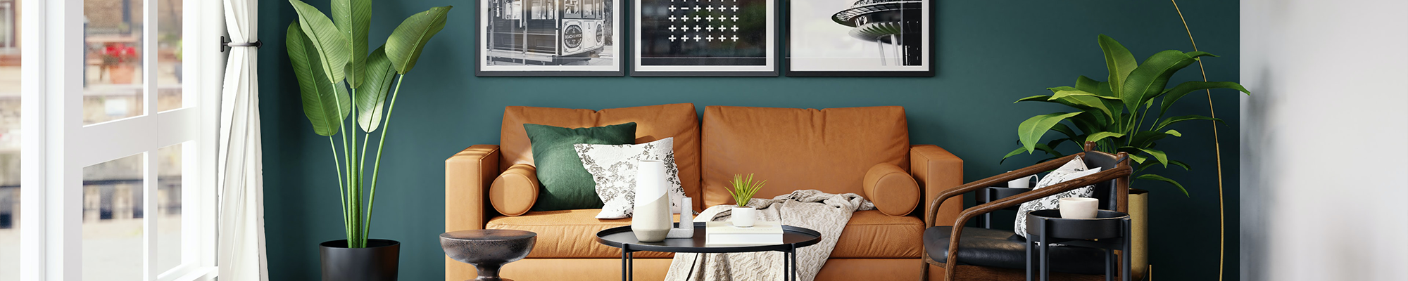 living room with orange couch and houseplants with pictures on the wall from Floor Fashions of Virginia in the Charlottesville, VA area